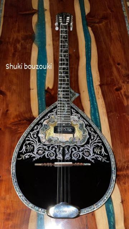 בוזוקי גיטרות וכלי מיתר בוזוקי גיטרות וכלי מיתר