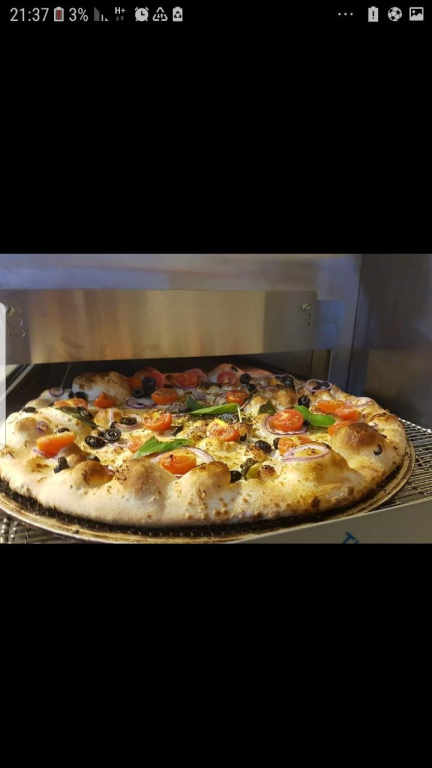 מאנצ'יז פיצה מאנצ'יז פיצה